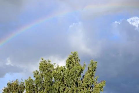 Rainbow on blue sky Stock Photos
