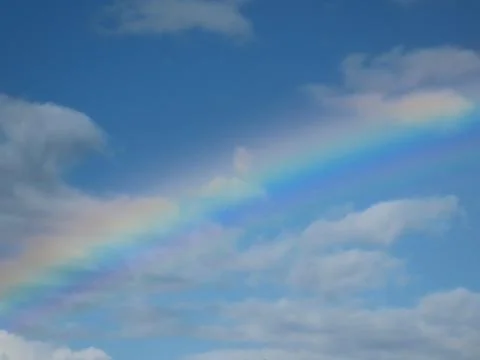 Rainbow in blue sky Stock Photos