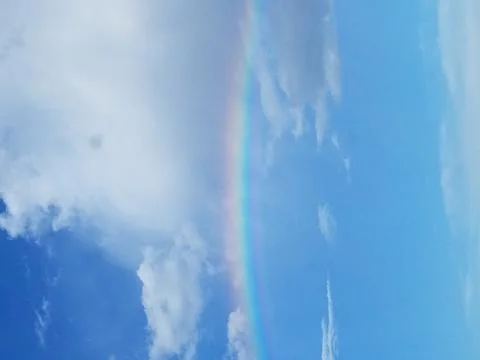 Rainbow in blue sky Stock Photos
