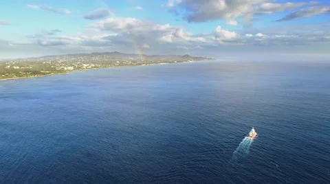 Rainbow &amp; Boat Off Coast Stock Footage 61106518