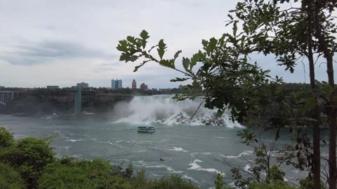 The Rainbow Bridge and the mist of the American Falls across the Niagara gorge Stock Footage 345996081