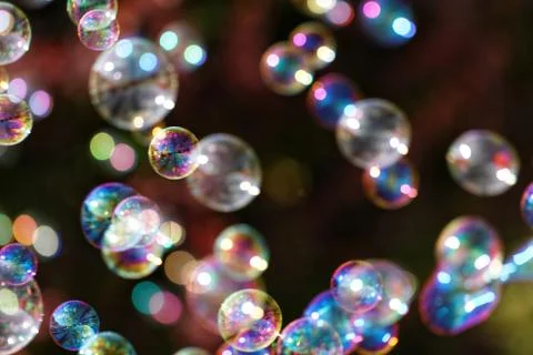 The rainbow bubbles from the bubble blower Stock Photos