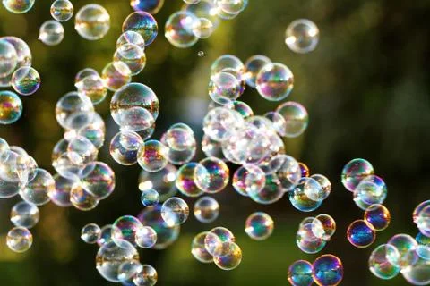 The rainbow bubbles from the bubble blower Stock Photos