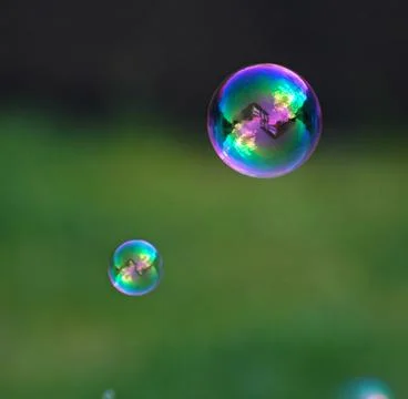 The rainbow bubbles from the bubble blower Stock Photos