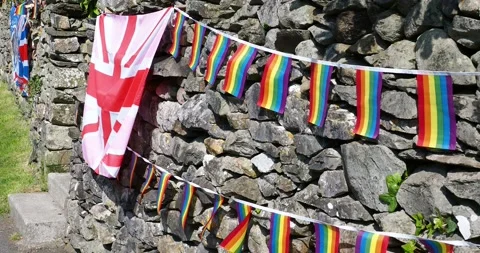 Rainbow bunting at the annual Austwick Cuckoo Festival during the queens plat Vídeos de archivo 239763398