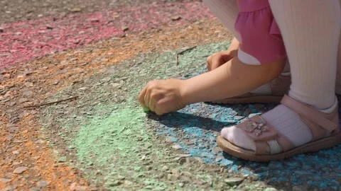 Rainbow child hand drawing chalk asphalt, child kid childhood dream, little Stock Footage 275135615