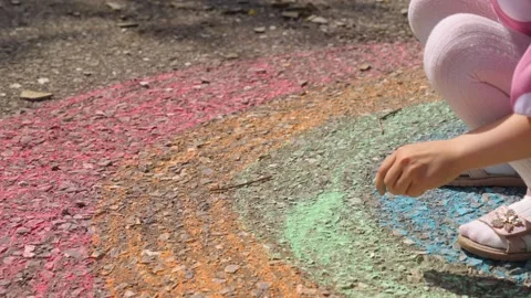 Rainbow child hand drawing chalk asphalt, child kid childhood dream, little Stock Footage 280347951