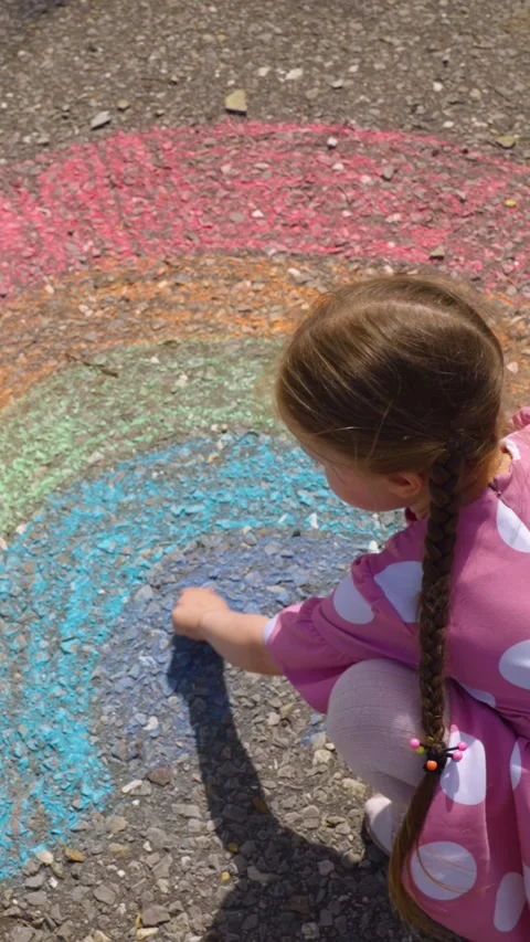 Rainbow child hand drawing chalk asphalt, child kid childhood dream, little Stock Footage 307771057