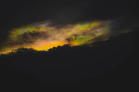 A rainbow cloud  called cloud iridescence nature background Stock Photos