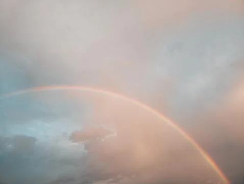 Rainbow On a Cloudy Day Stock Photos