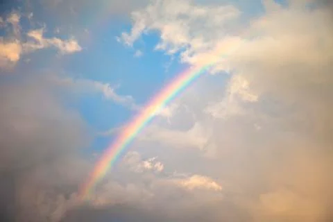 Rainbow in the Cloudy Sky Stock Photos