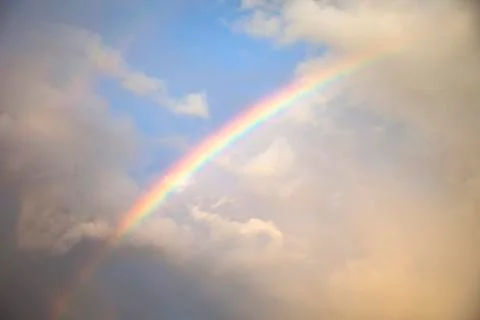 Rainbow in the Cloudy Sky Stock Photos