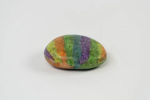 Rainbow color on round rock Stock-Fotos