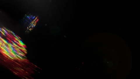 Rainbow-colored bokeh light leak reflections &amp; bokeh Stock Footage 293684561