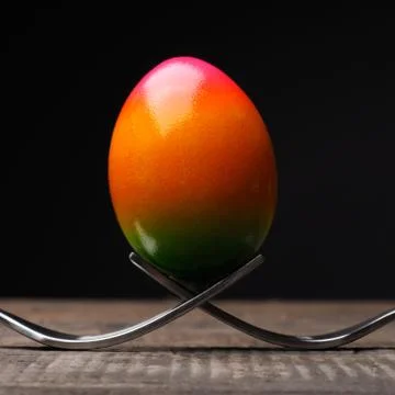 Rainbow colored Easter egg Stock Photos