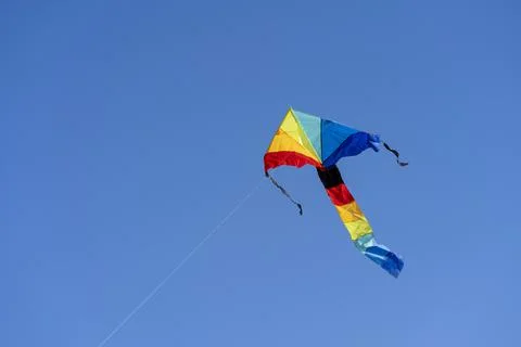 Rainbow colored kite Stock Photos