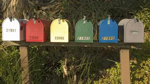 Rainbow colored mail boxes lined up in Malibu, California Stock Photos