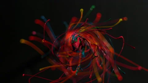 Rainbow of colored paint spiral in slow motion, on black ALPHA MATTE Stock Footage 64006387
