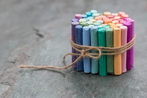 Rainbow colored pastel crayon Stock Photos
