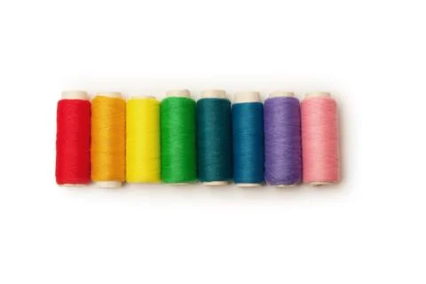Rainbow colored set of threads Stock Photos