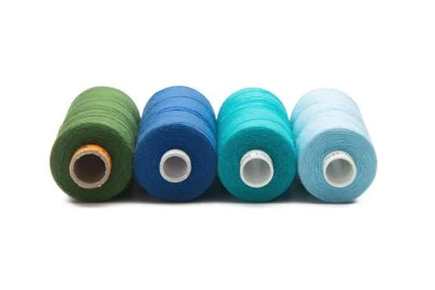 Rainbow colored sewing thread lined Stock Photos