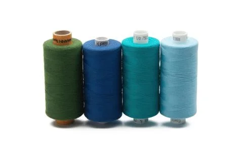 Rainbow colored sewing thread lined Stock Photos