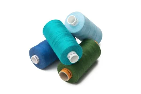 Rainbow colored sewing thread lined Stock Photos