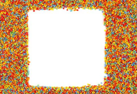 Rainbow colored sugar sprinkle dots, decorative square frame mockup. Stock Photos