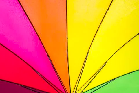 Rainbow colored summer umbrella pattern Stock Photos