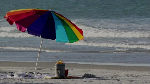 Rainbow Colored Umbrella on the Beach 動画素材 35337763