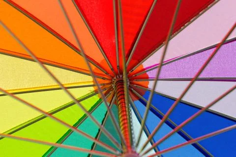 Rainbow colored umbrella Stock Photos