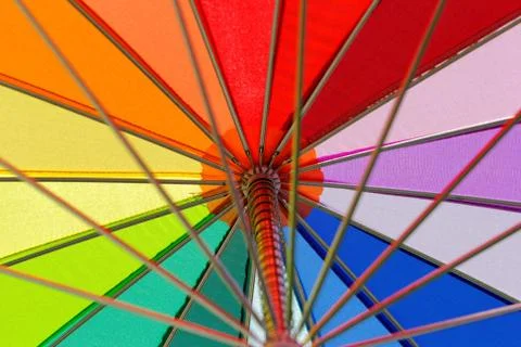 Rainbow colored umbrella Stock Photos