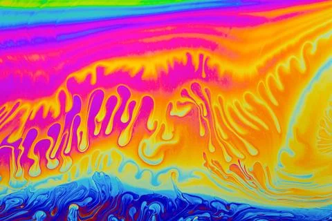 Rainbow colors. Psychedelic multi colored patterns background. Photo macro .. Illustrazione stock