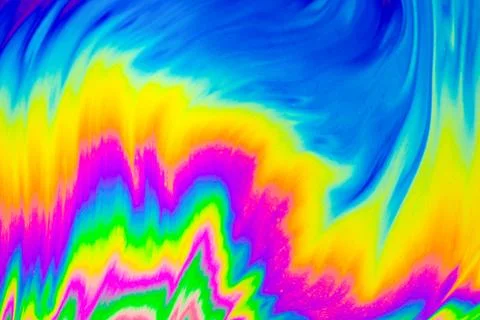 Rainbow colors. Psychedelic multi colored patterns background. Photo macro .. 写真素材