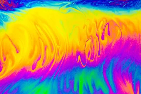 Rainbow colors. Psychedelic multi colored patterns background. Photo macro .. 写真素材