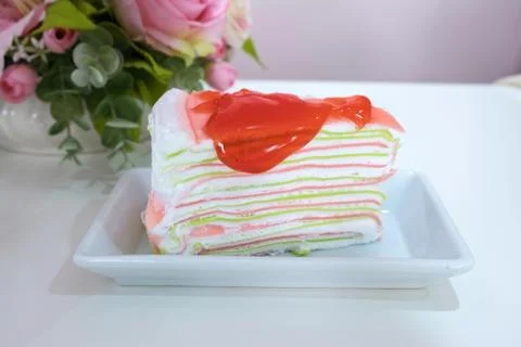 Rainbow crape cake on plate Stock Photos