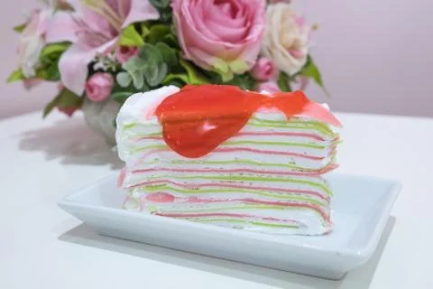 Rainbow crape cake on plate Stock Photos