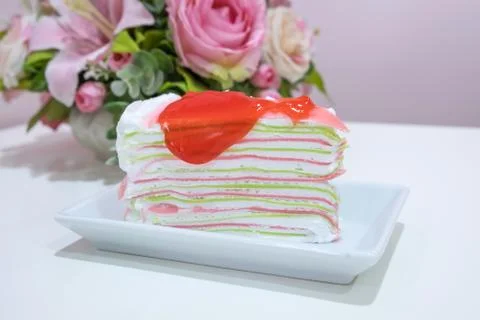 Rainbow crape cake on plate Stock Photos