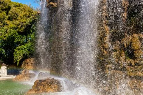 The rainbow created by the man-made waterfall on the touristic Castle Hill of Stock Photos