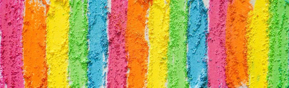 Rainbow creative background of lines drawn with multi-colored crayons. Stock Photos