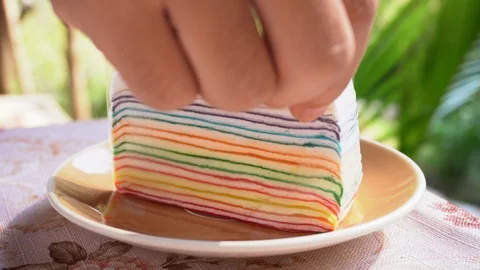 Rainbow Crepes Cake in white plate. Stock Footage 123604953