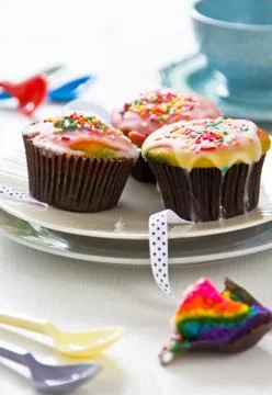 Rainbow cupcakes Stock Photos