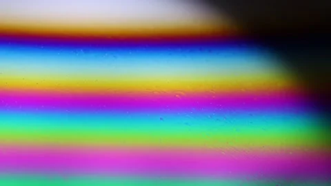 Rainbow in the darkness, liquid surface reflection Stock Footage 298625507