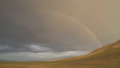 Rainbow in the desert of the gobi from the dunes Stock Footage 116432673
