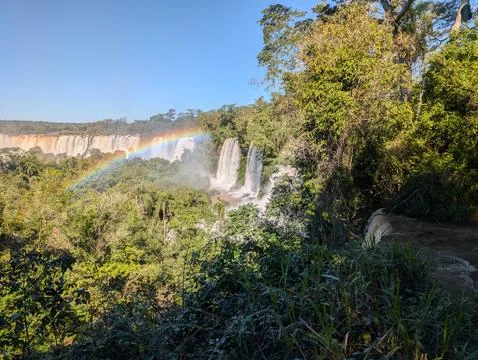 A rainbow at Devil's Throat Falls in the Iguazu Falls cascade in Iguazu Natio Stock Photos