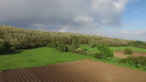 Rainbow disappears in the clouds Stock Footage 71247678