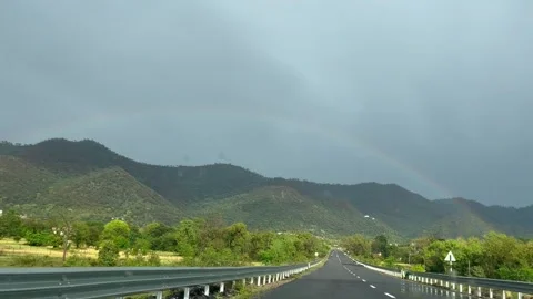 Rainbow Drive on Highway Stock Footage 337660338