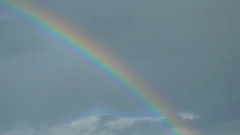 Rainbow that ends its run amid the trees of a hill in Chianti. Montepulciano Stock Footage 111439066