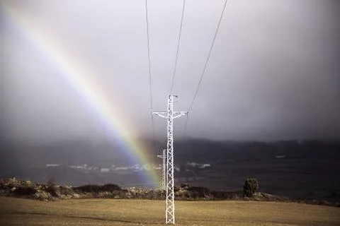Rainbow in field Foto stock