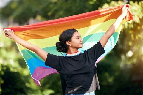 Rainbow, flag and human rights with an indian woman in celebration of lgbt gay Stock Photos
